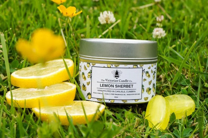 lemons and a tin candle called lemon sherbet