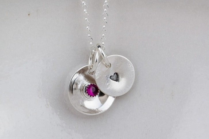Silver and amethyst necklace with heart motif