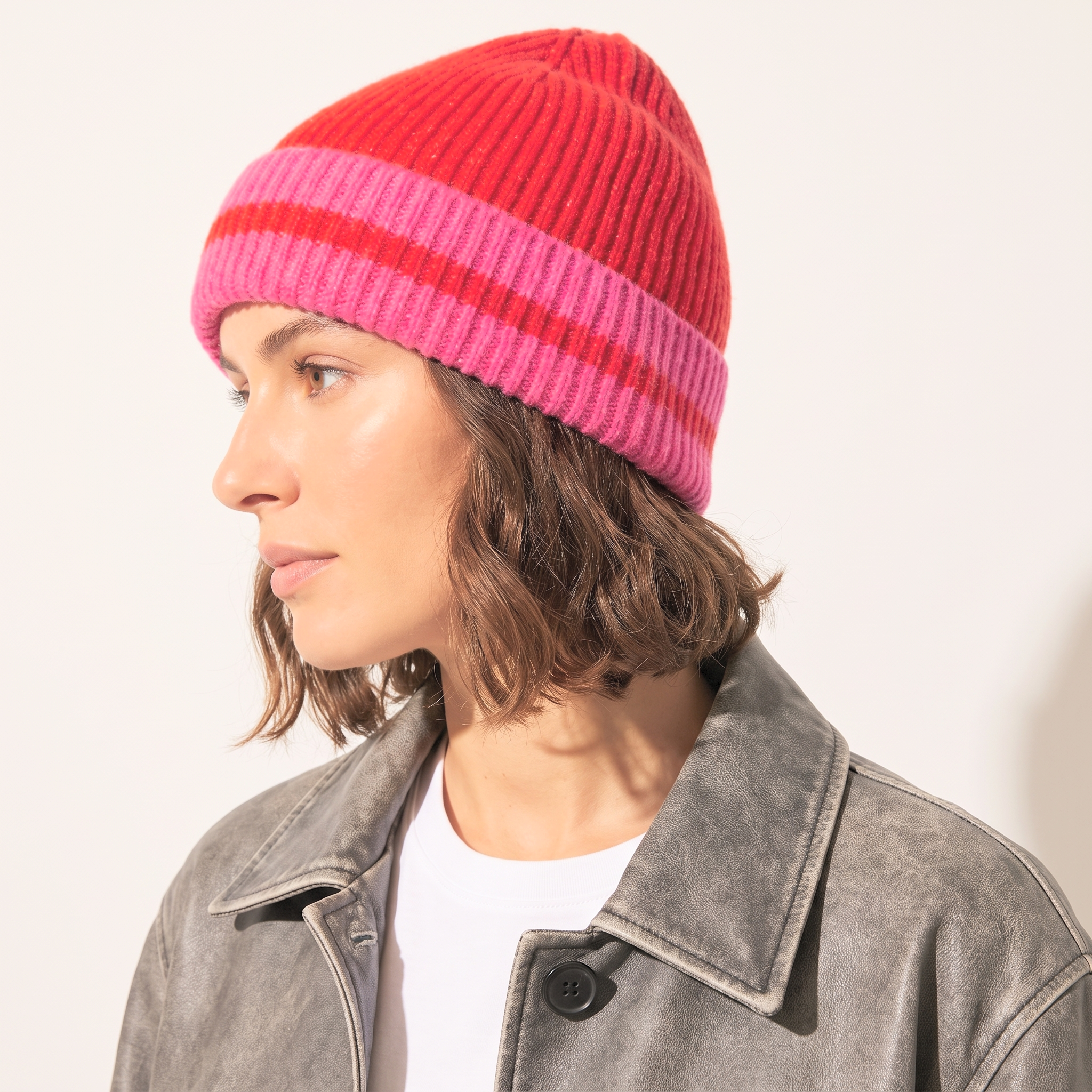 Sarta striped beanie hat in red and hot pink with ribbed knit texture