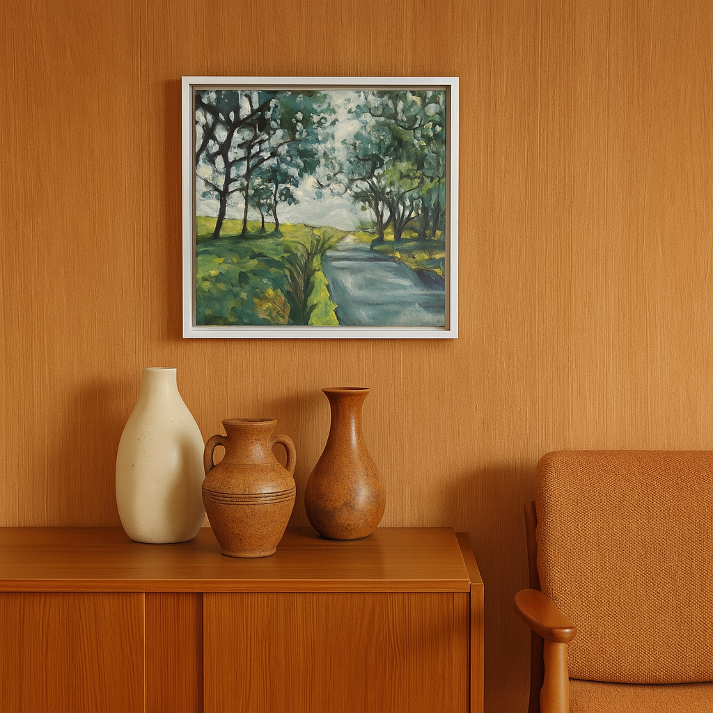 Framed landscape painting above a wooden cabinet with decorative vases and a chair.