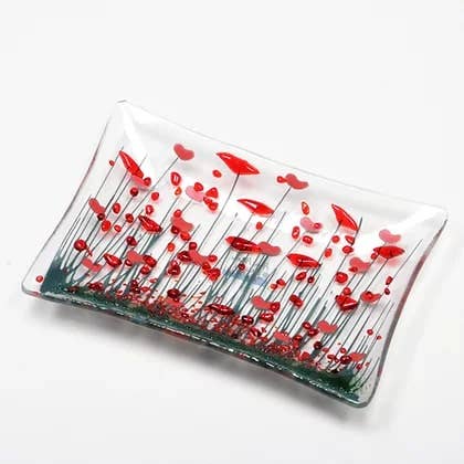 Decorative glass plate with red floral POPPY  design on a white background