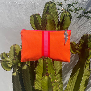 BRIGHT ORANGE LUCKY STRIPE CLUTCH BY COCKATOO