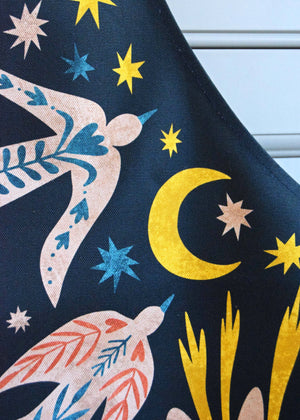 FOLK BIRDS COTTON APRON BY FREYA SNOW
