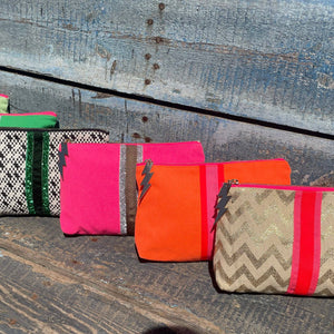 BRIGHT ORANGE LUCKY STRIPE CLUTCH BY COCKATOO