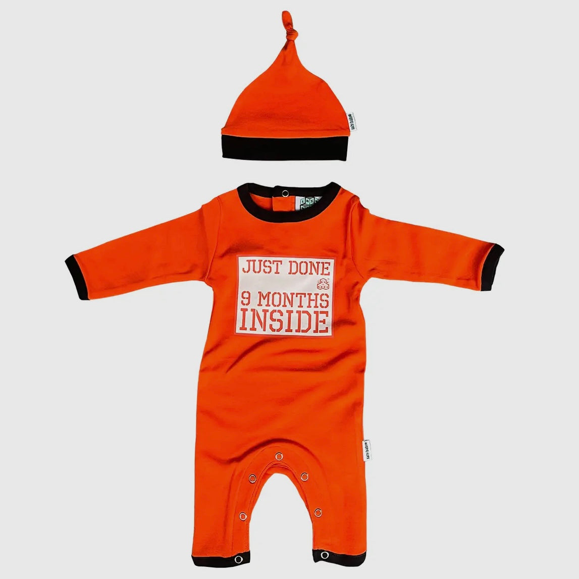 ORANGE JUST DONE 9 MONTHS INSIDE BABY GROW - 0-6 MONTHS