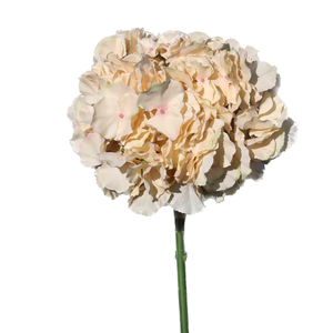 Artificial flower with gold and white petals on a white background