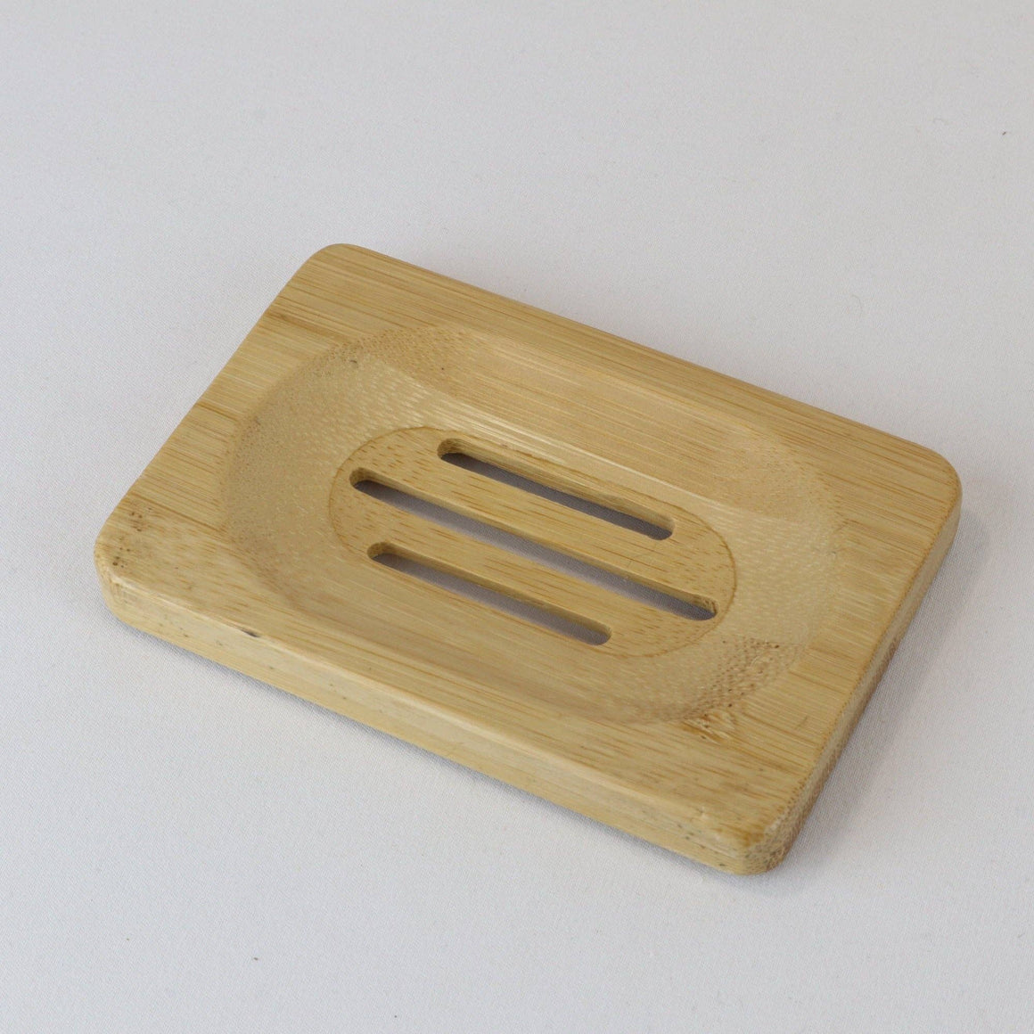 Wooden soap dishes in three stylish designs from Cosy Cottage Soap, featuring natural wood textures and elegant craftsmanship.
