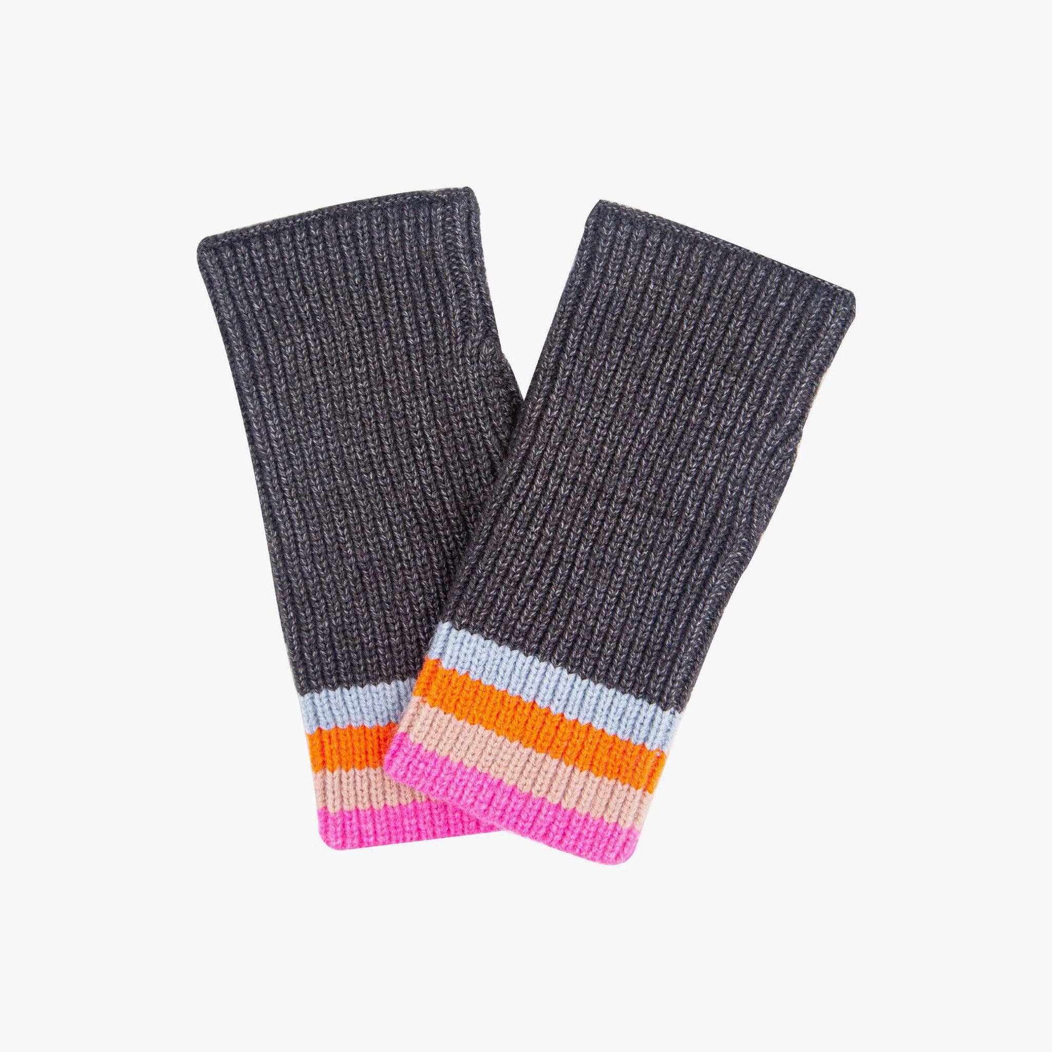 Pair of gray knit arm warmers with colorful striped cuffs on a white background