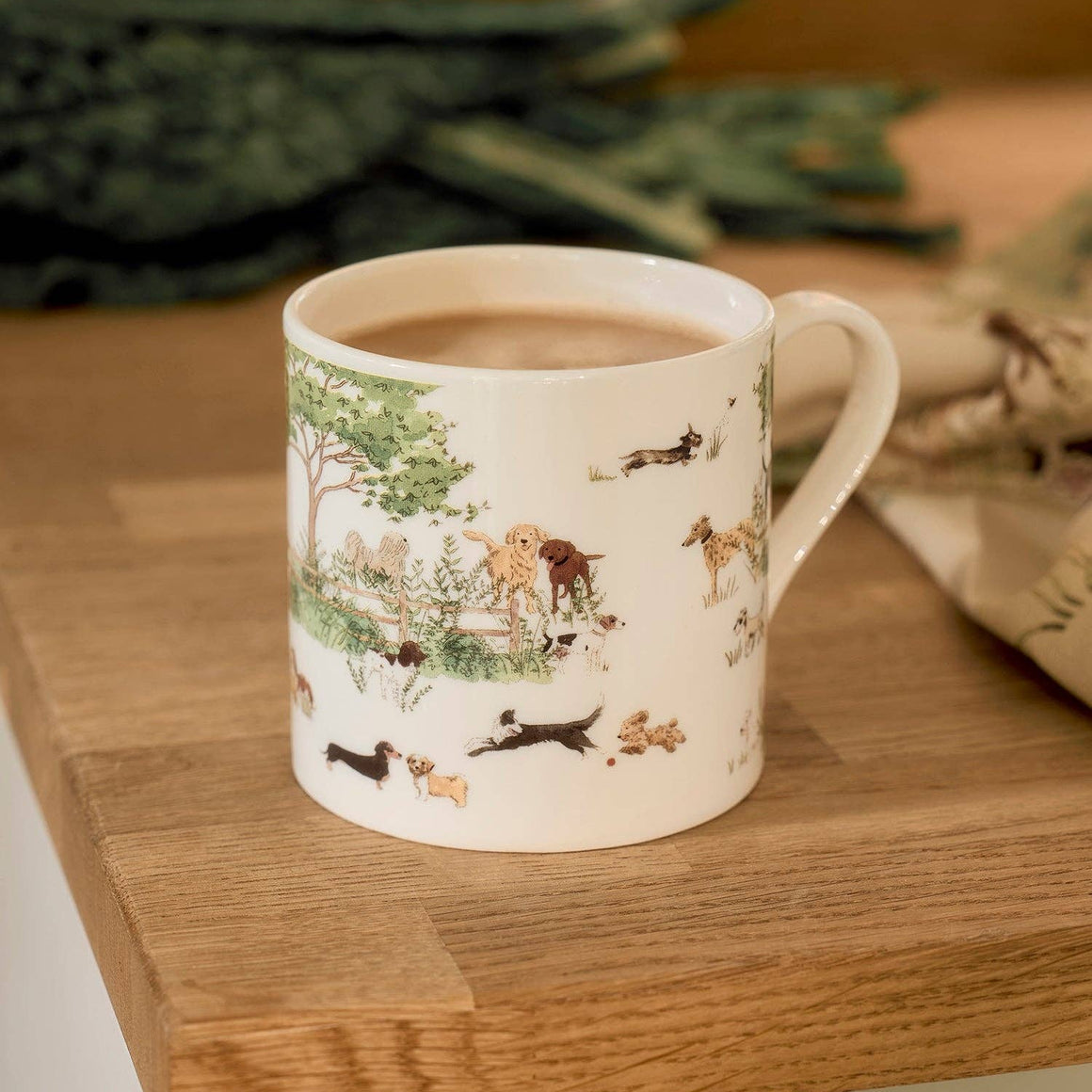 Sophie Allport Tails & Trails mug with woodland animal illustrations on white ceramic, featuring fox, deer, and bird designs.