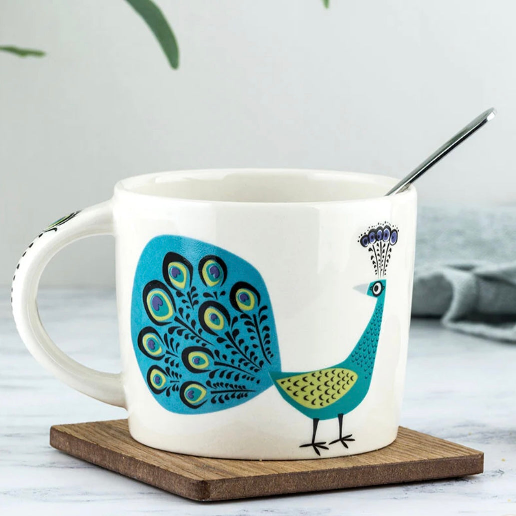 PEACOCK MUGS BY HANNAH TURNER