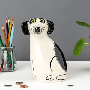  ceramic lemur-shaped money box on a white surface with a gray background