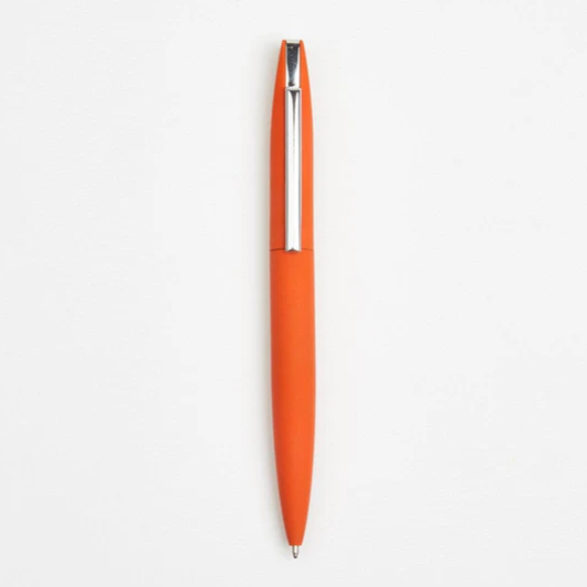 Orange pen on a white background