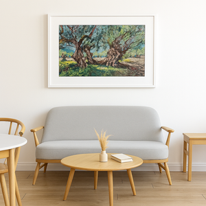 Living room with a gray sofa, wooden coffee table, and a framed landscape painting on the wall.