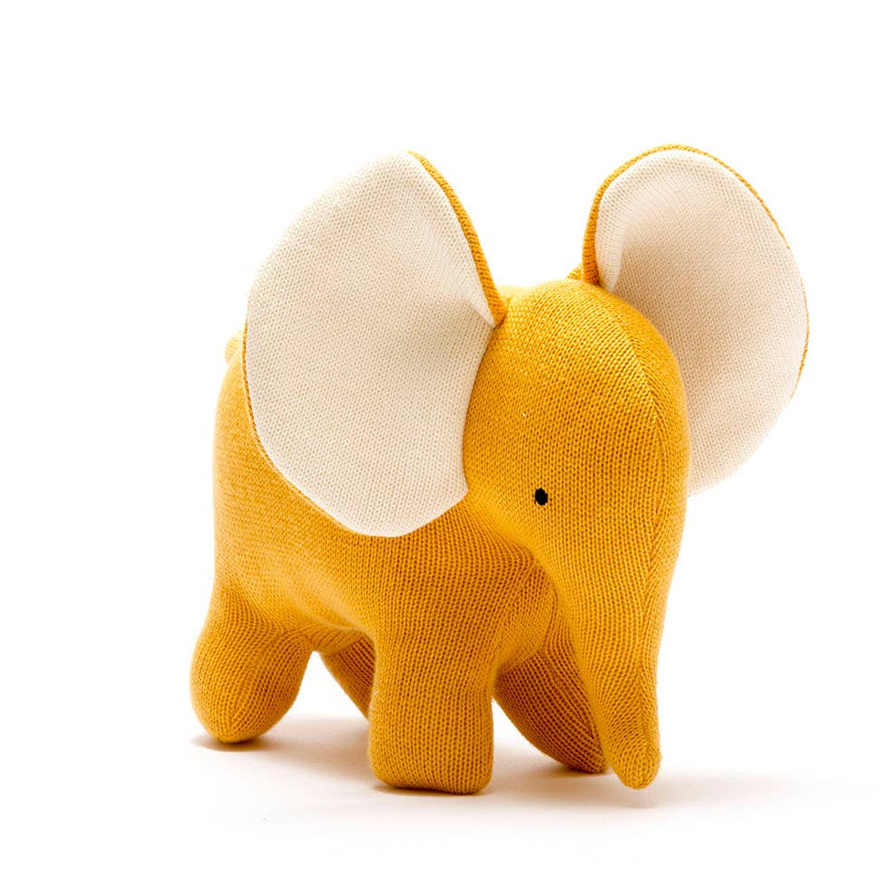 Yellow elephant plush toy on a white background