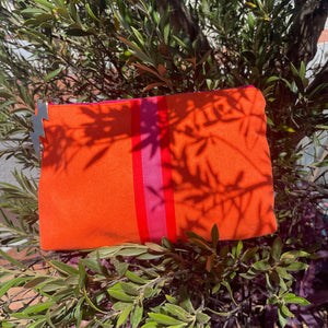 BRIGHT ORANGE LUCKY STRIPE CLUTCH BY COCKATOO