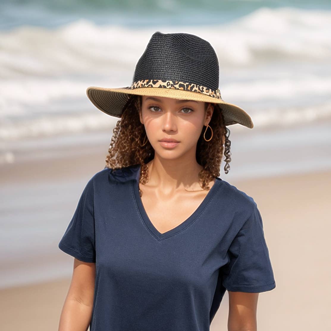 Black Ginger two-tone Panama foldable hat in black and natural colors, showing the stylish wide brim and lightweight design.