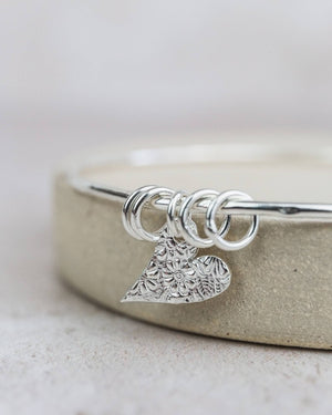 Sterling Silver Textured Tilted Heart Charm Bangle