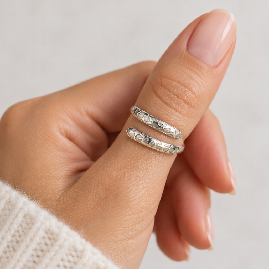 Sterling silver leopard print wrap thumb ring by Lucy Kemp Jewellery featuring a bold animal pattern and stylish design.