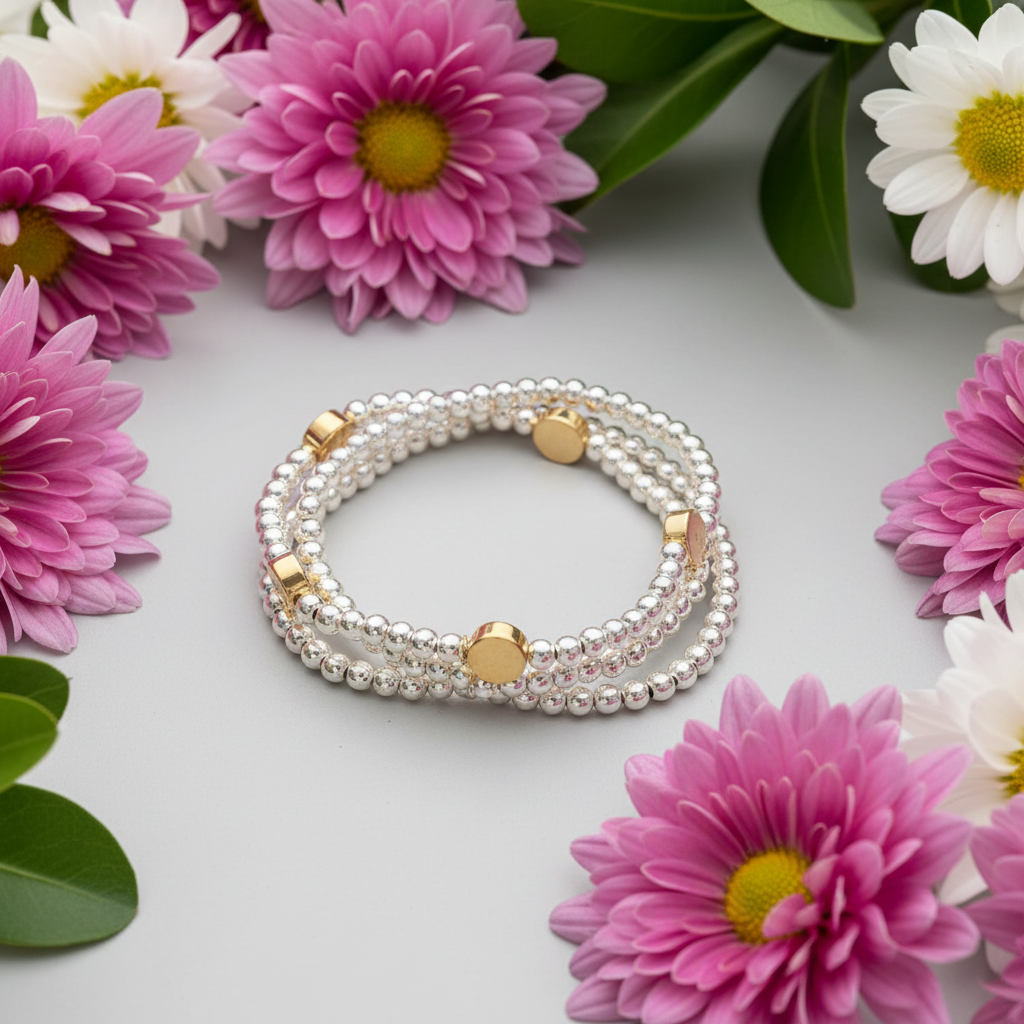 TRIPLE STRAND SILVER BEAD AND GOLD CIRCLE BRACELET
