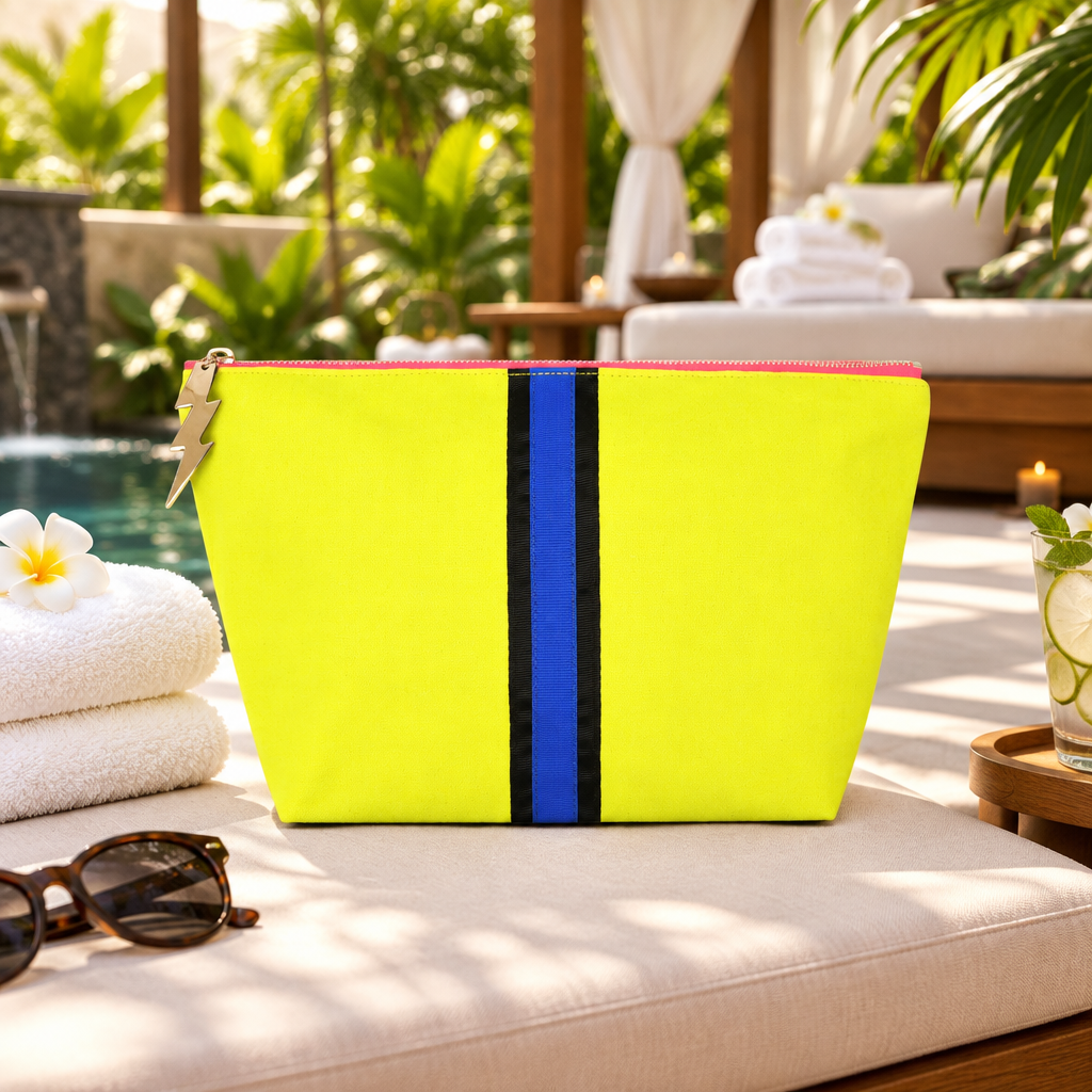 Large yellow Lucky Stripe washbag by Cockatoo with bold stripe design, ideal for travel and organization of toiletries.