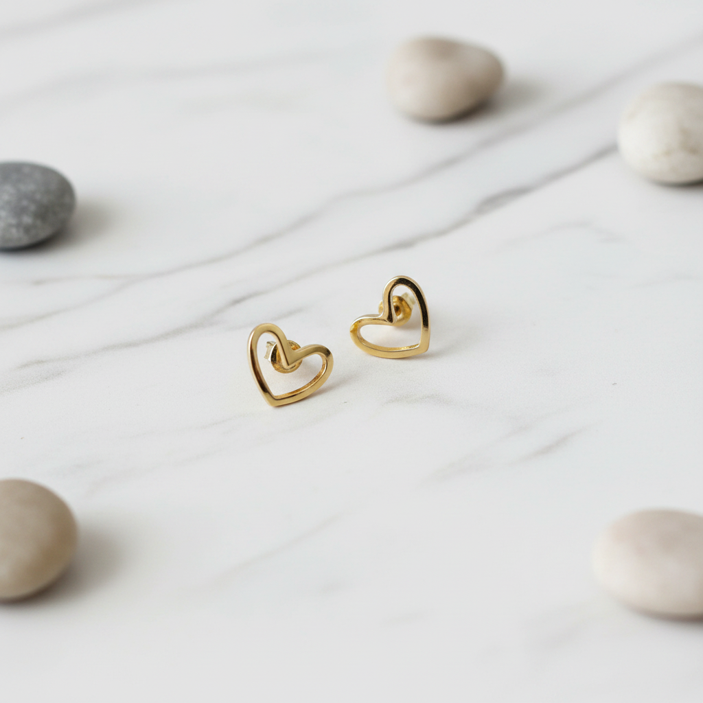 HOLLOW HEART GOLD STUD EARRINGS