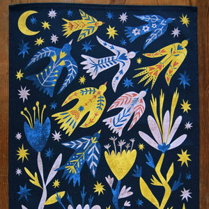 Colorful artwork with birds, flowers, and stars on a dark background