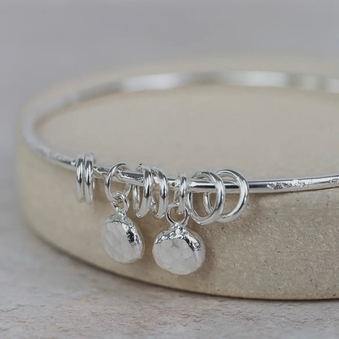 STERLING SILVER NUGGET CHARM BANGLE WITH RINGS - Feather & Twigs