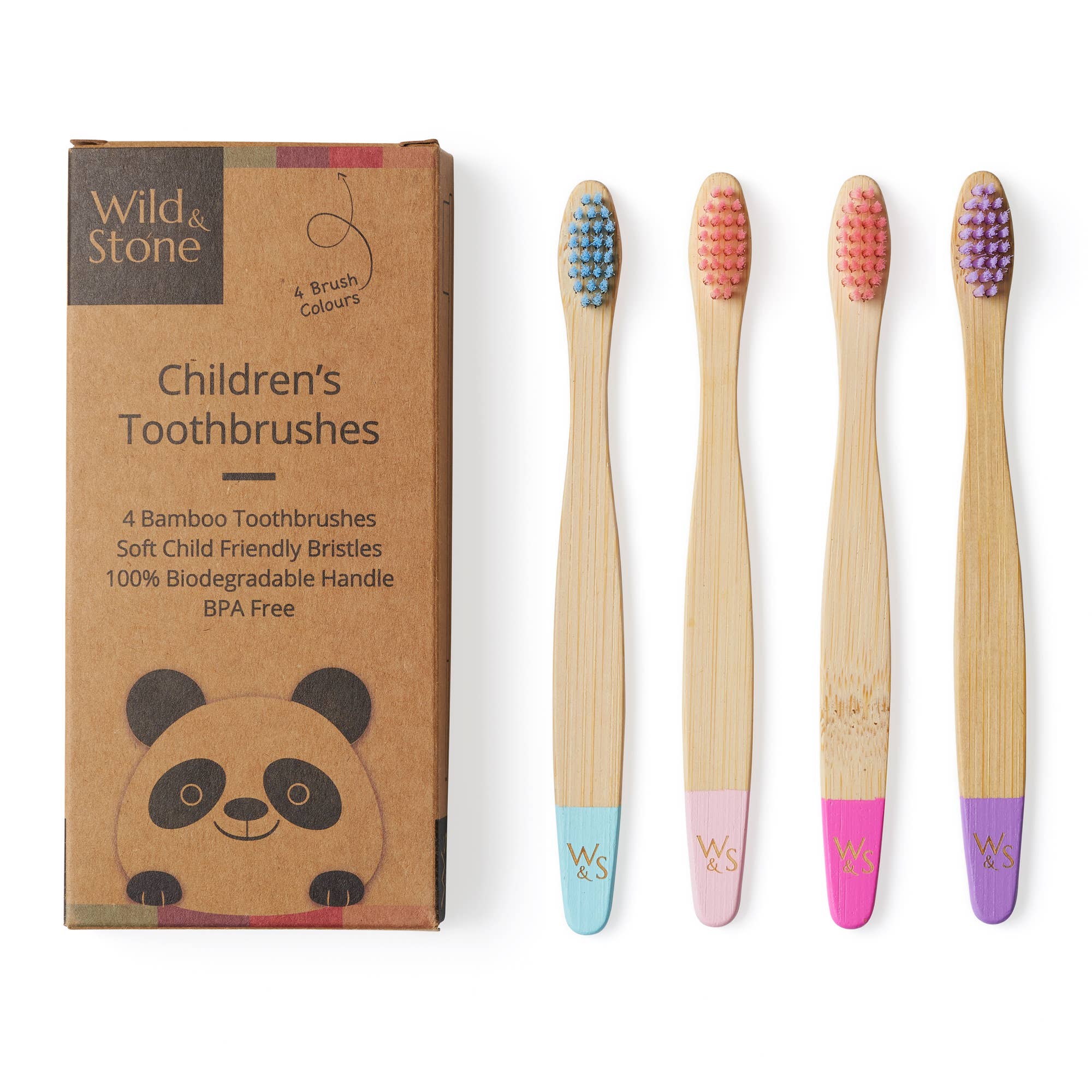 Set of four children's bamboo toothbrushes with colored bristles next to their packaging.