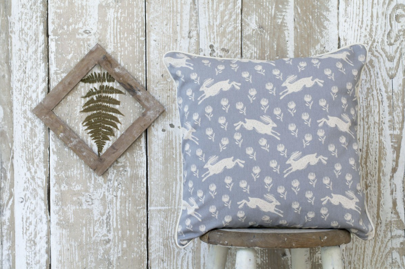 RUNNING HARE PATTERN GREY COTTON CUSHION BY SAM WILSON - Feather & Twigs
