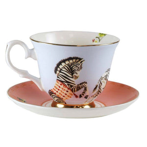 CUP AND SAUCER BY YVONNE ELLEN - TWO BEAUTIFUL DESIGNS
