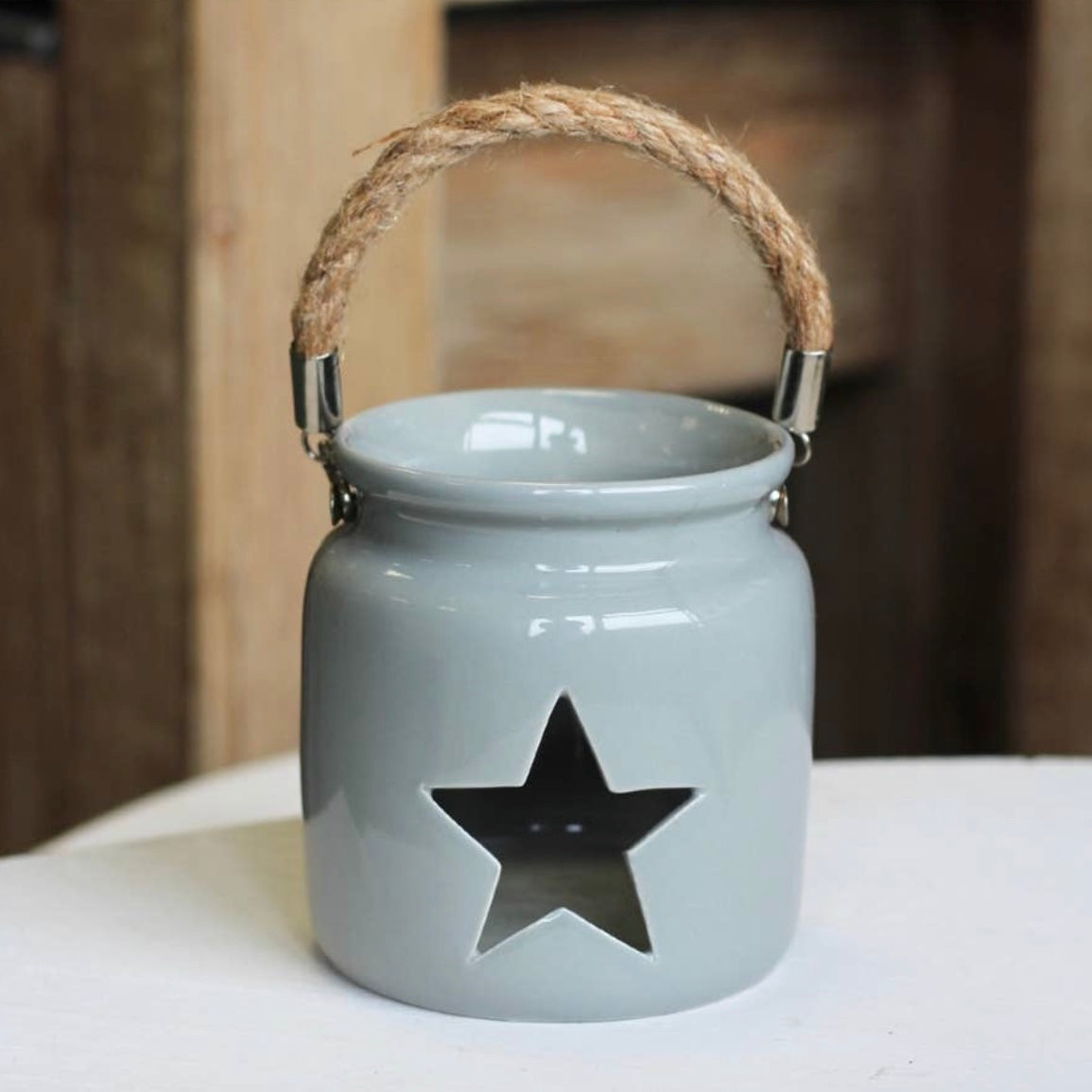 GREY STAR T-LIGHT HOLDER